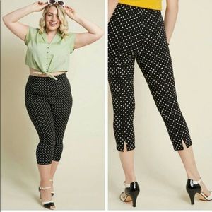 trousers in a black with small polka dots